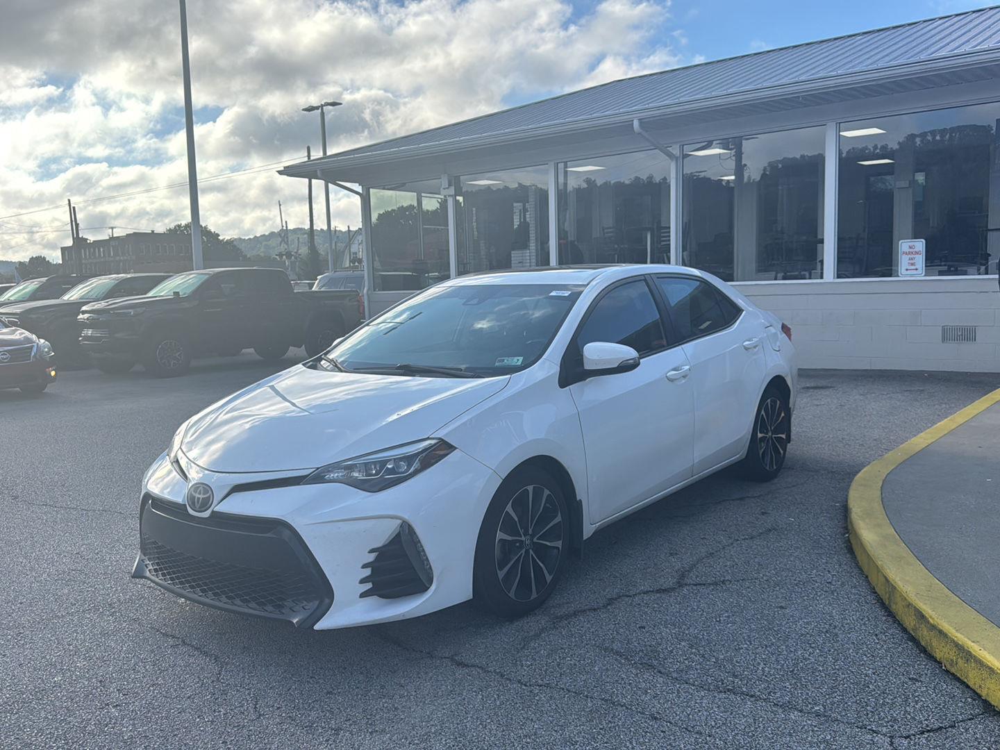Super White 2019 Toyota Corolla Sedan Front-Wheel Drive Continuously Variable Transmission