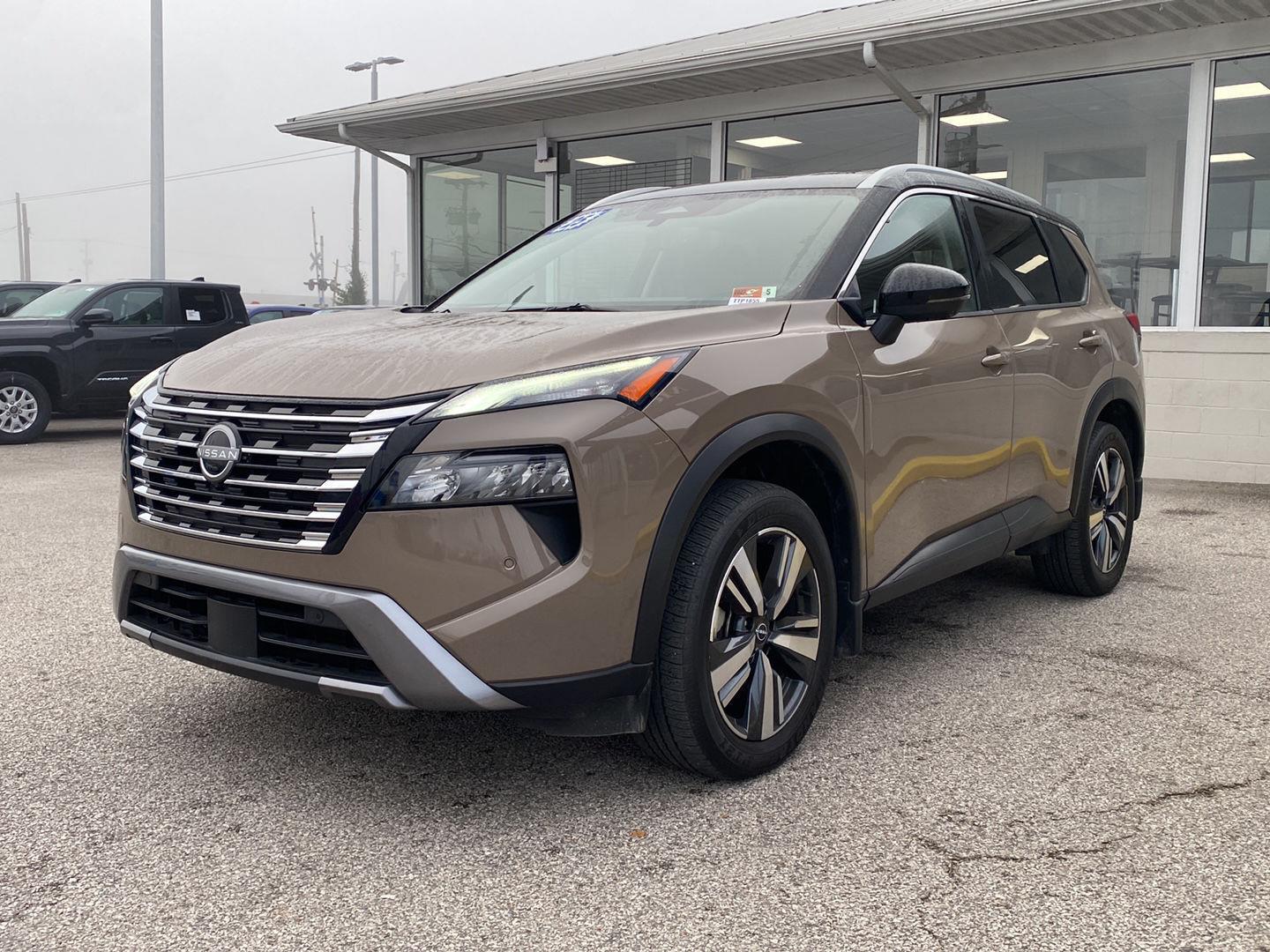 Baja Storm Metallic/Super Black 2025 Nissan Rogue SUV / Crossover All-Wheel Drive Continuously Variable Transmission
