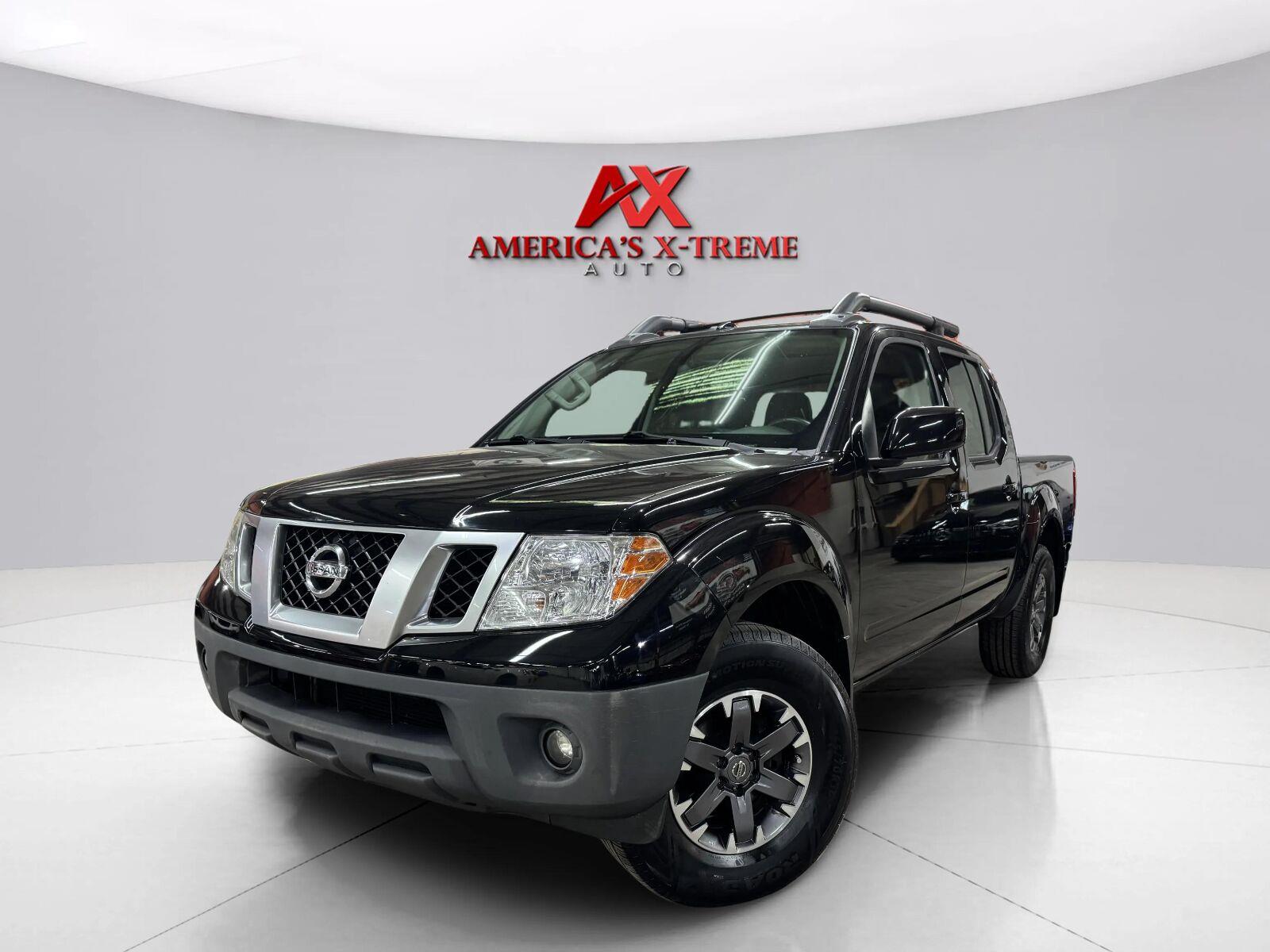 Gray (Magnetic Black) 2017 Nissan Frontier Pickup Truck Four-Wheel Drive Automatic