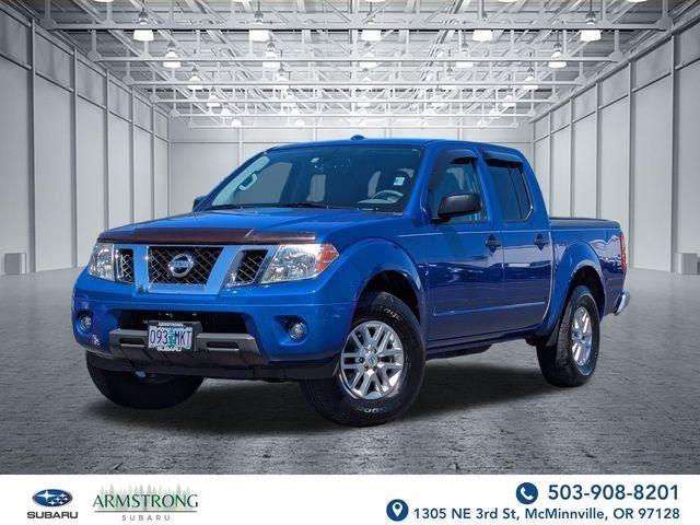 Metallic Blue 2015 Nissan Frontier Pickup Truck Four-Wheel Drive Automatic