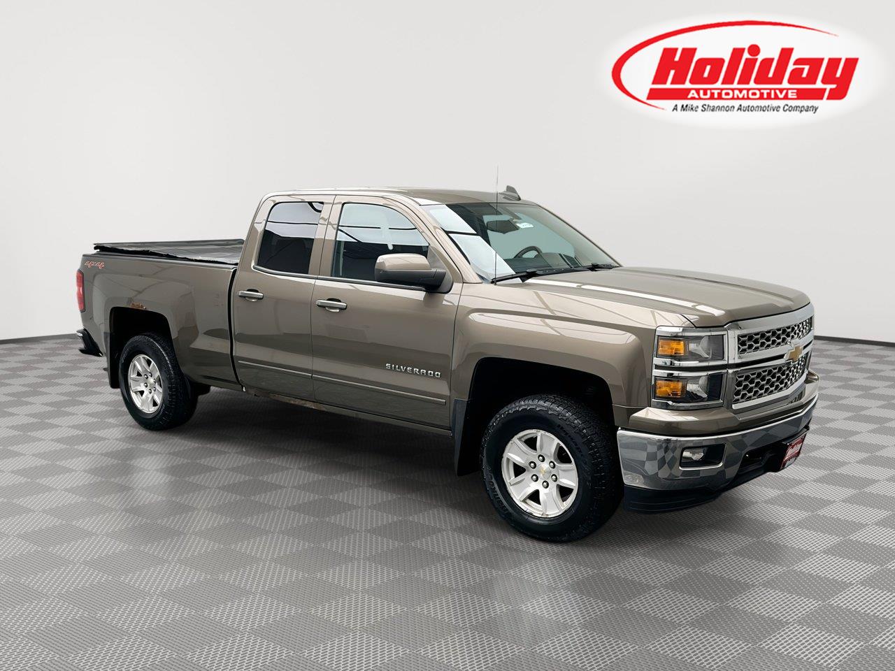 Brownstone Metallic 2015 Chevrolet Silverado 1500 Pickup Truck Four-Wheel Drive 6-Speed Automatic
