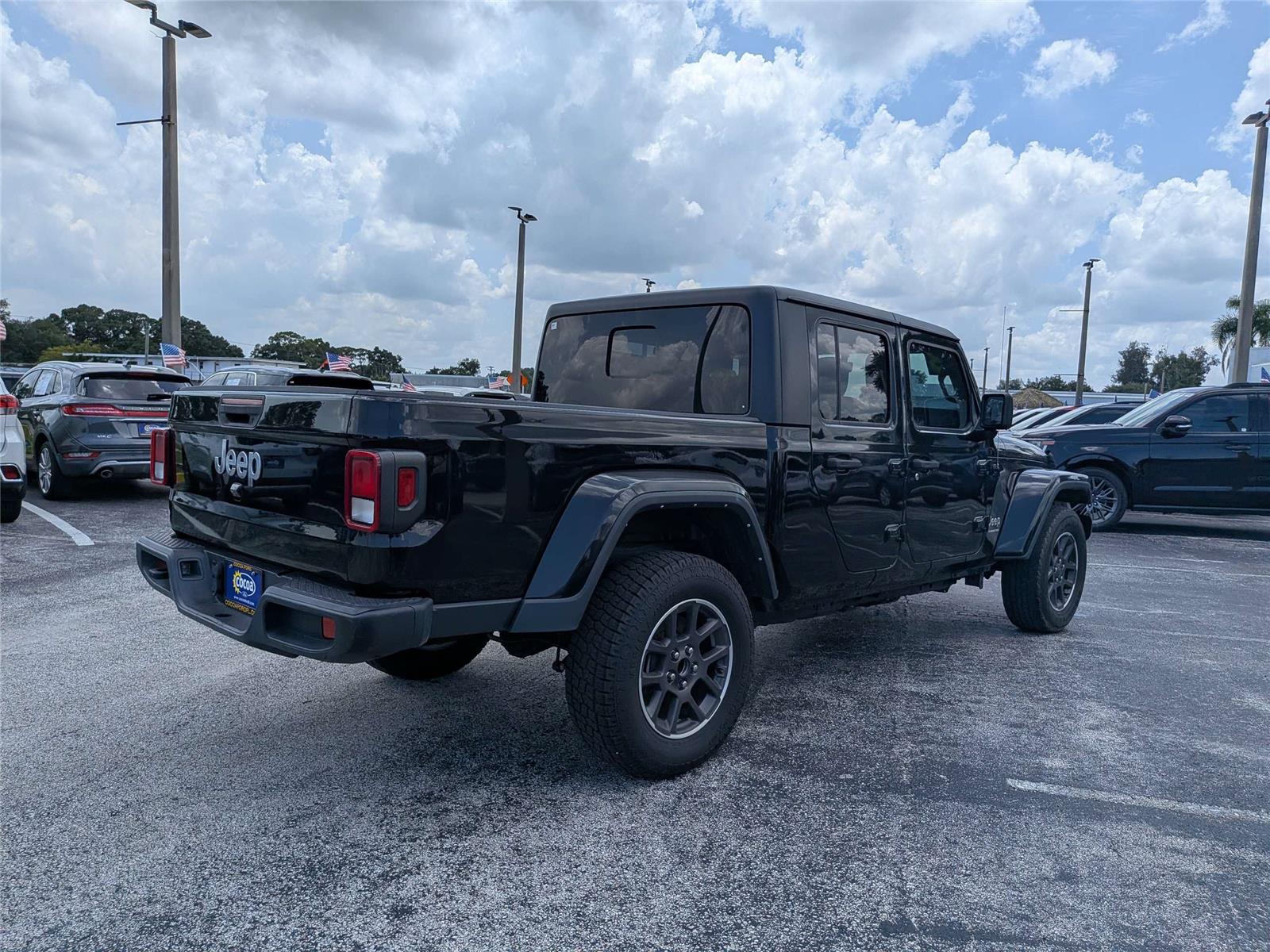View vehicle photo 3
