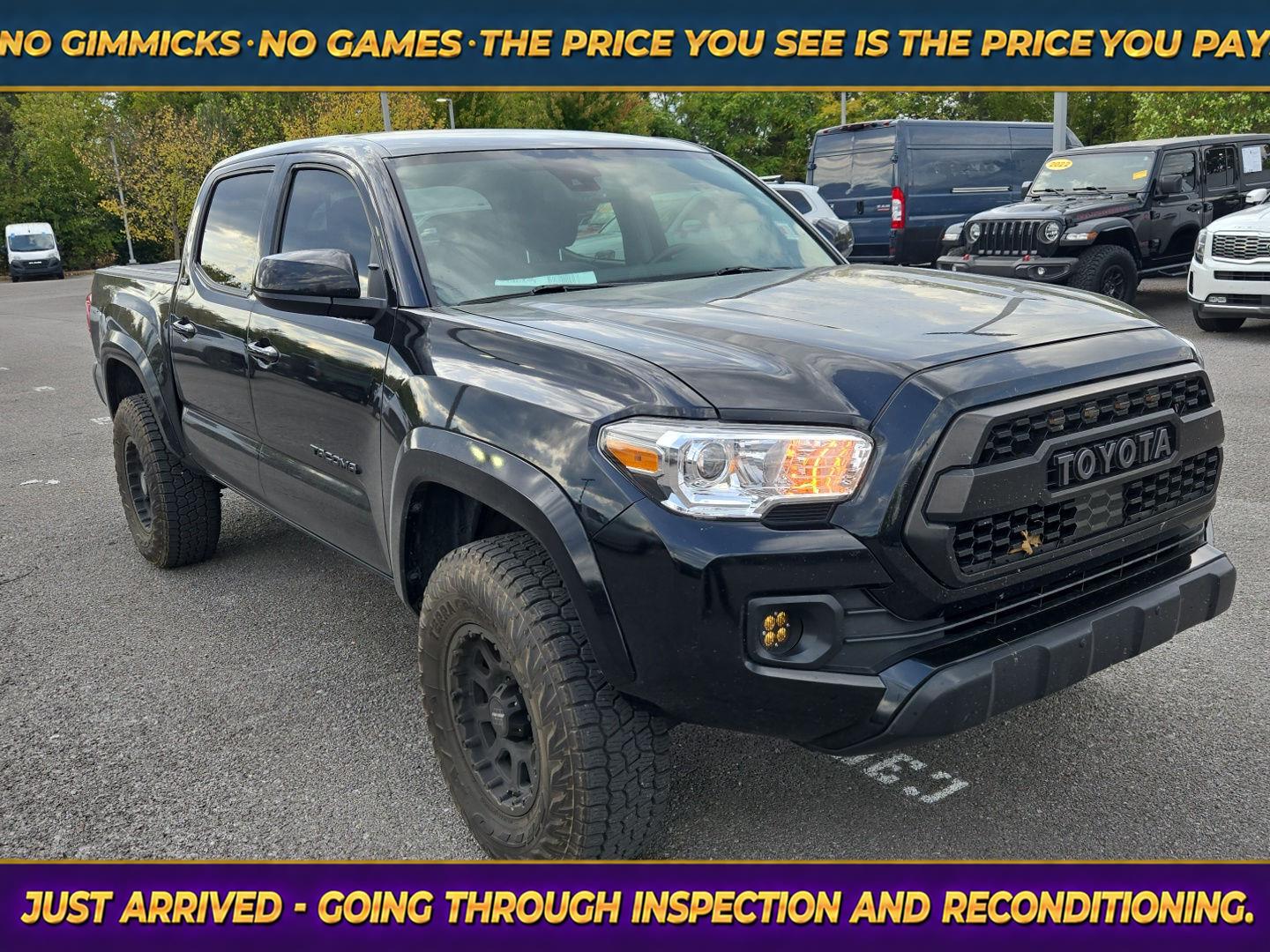 Midnight Black Metallic 2021 Toyota Tacoma Pickup Truck 4X2 Automatic
