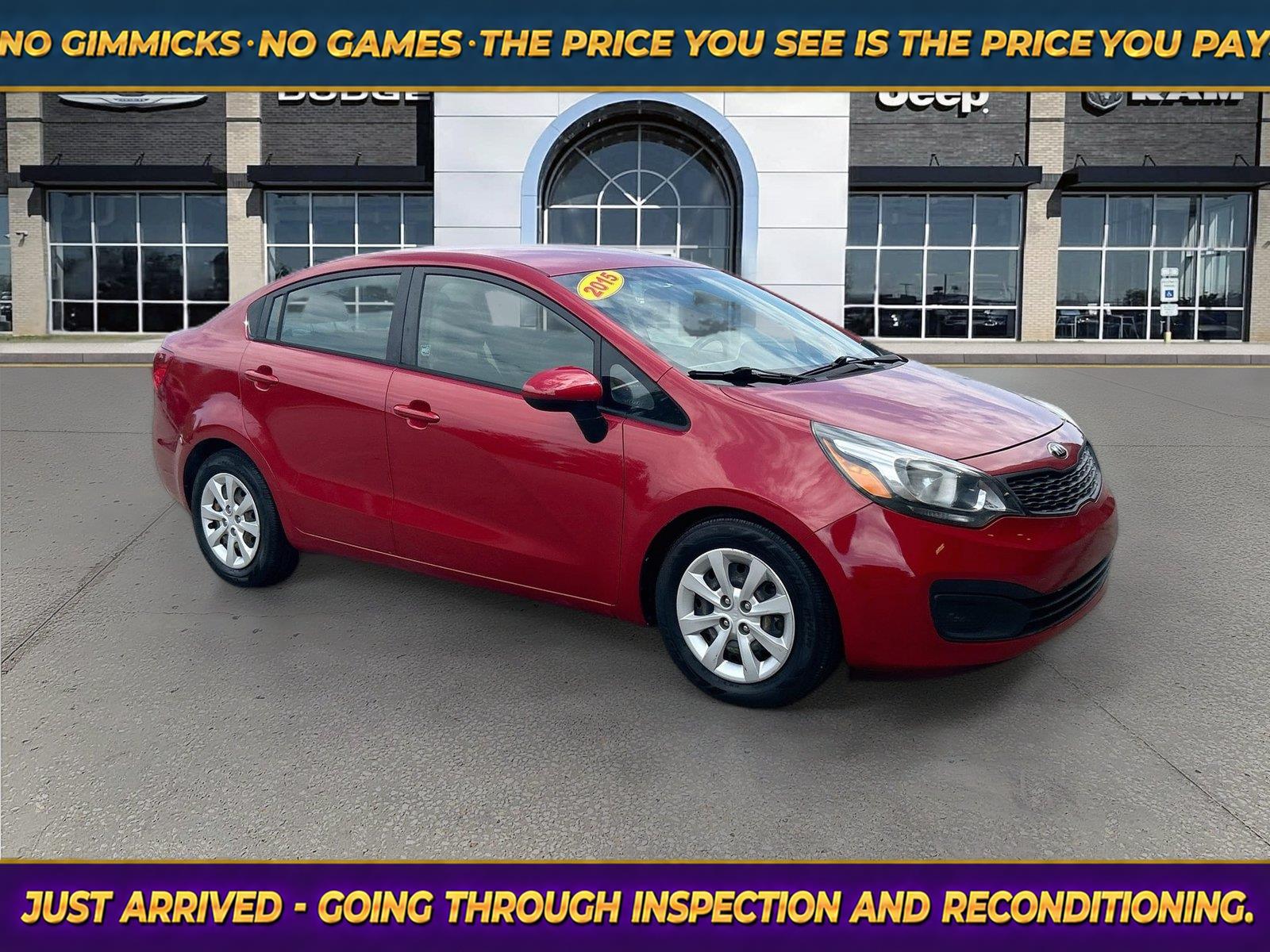 Signal Red 2015 Kia Rio Sedan Front-Wheel Drive 6-Speed Automatic
