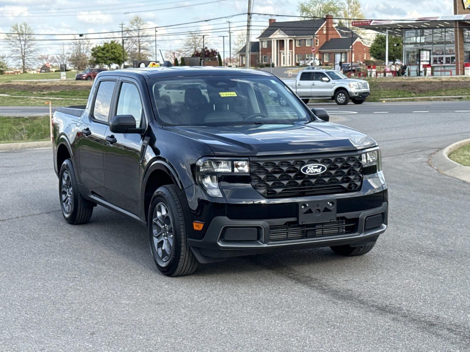 View vehicle photo 3