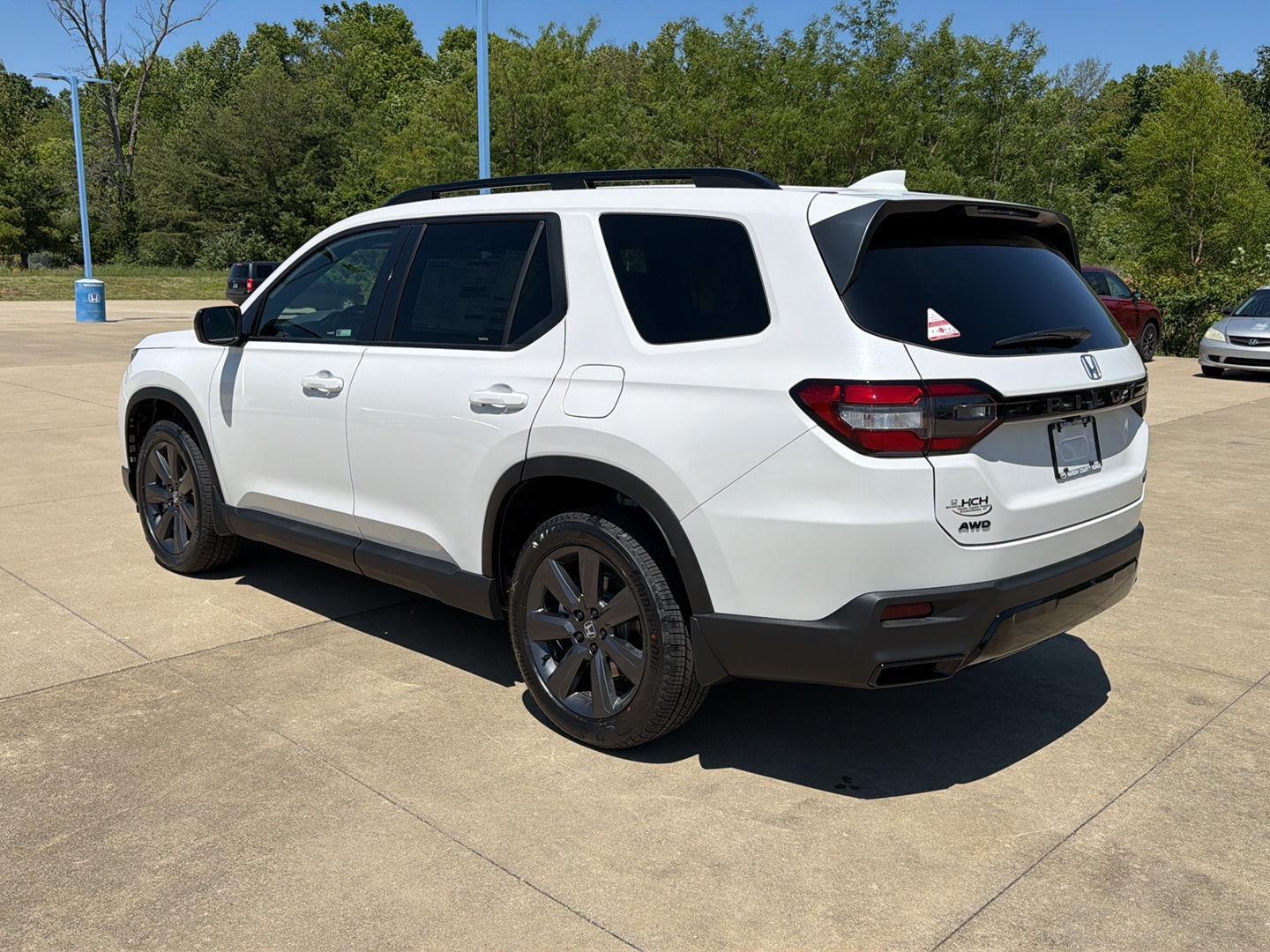 View vehicle photo 3