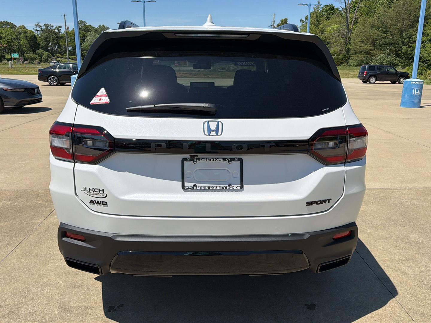 View vehicle photo 4