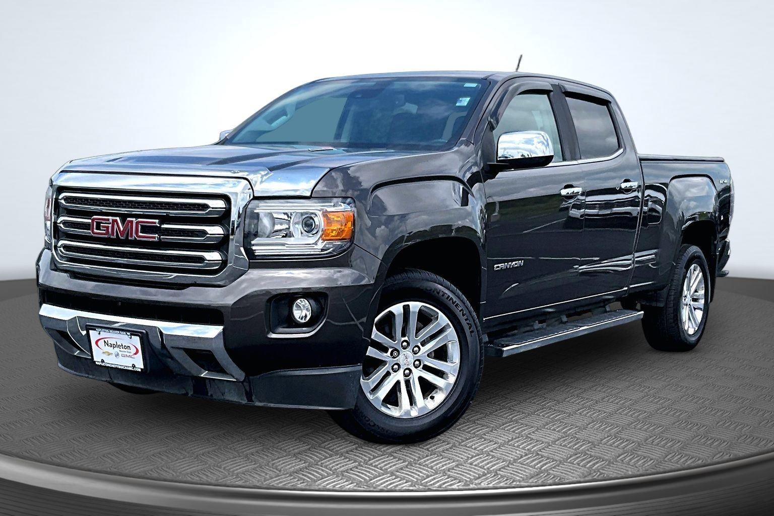 Smokey Quartz Metallic 2019 GMC Canyon Pickup Truck Four-Wheel Drive 8-Speed Automatic