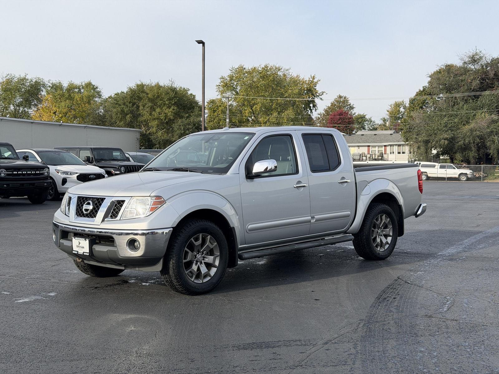 Brilliant Silver 2014 Nissan Frontier Pickup Truck Four-Wheel Drive Automatic