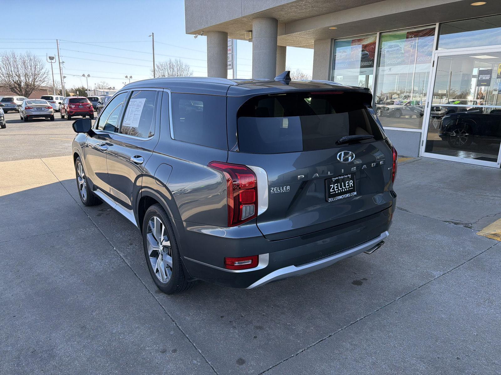 View vehicle photo 3