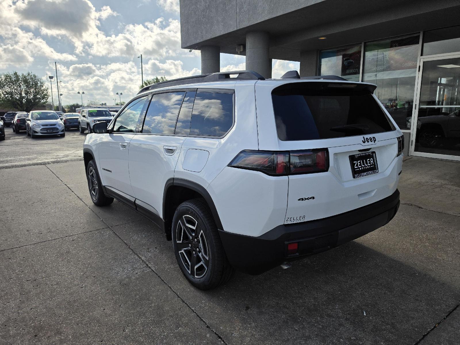 View vehicle photo 3