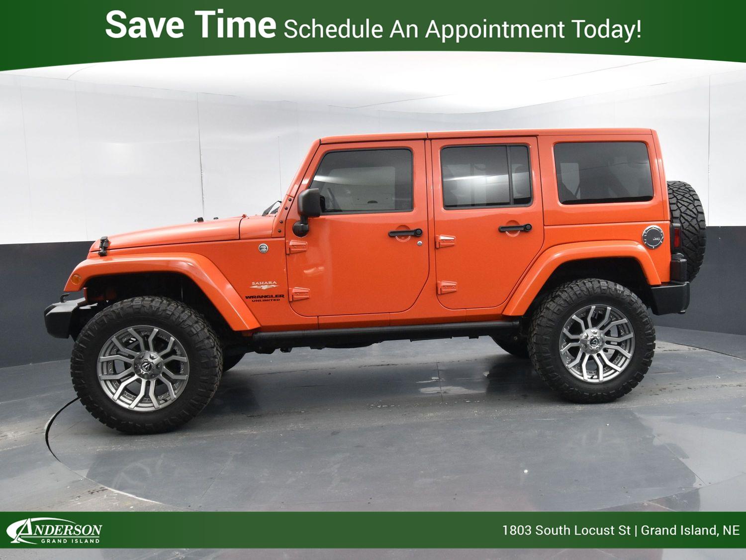 Used 2015 Jeep Wrangler Unlimited Sahara Stock: 13002077A