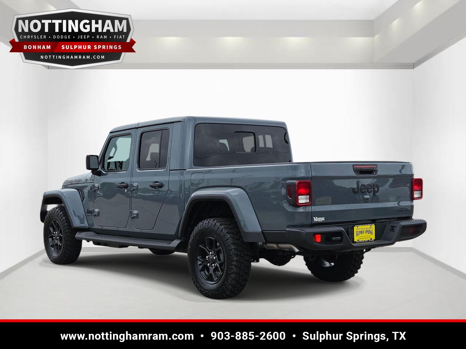 View vehicle photo 3