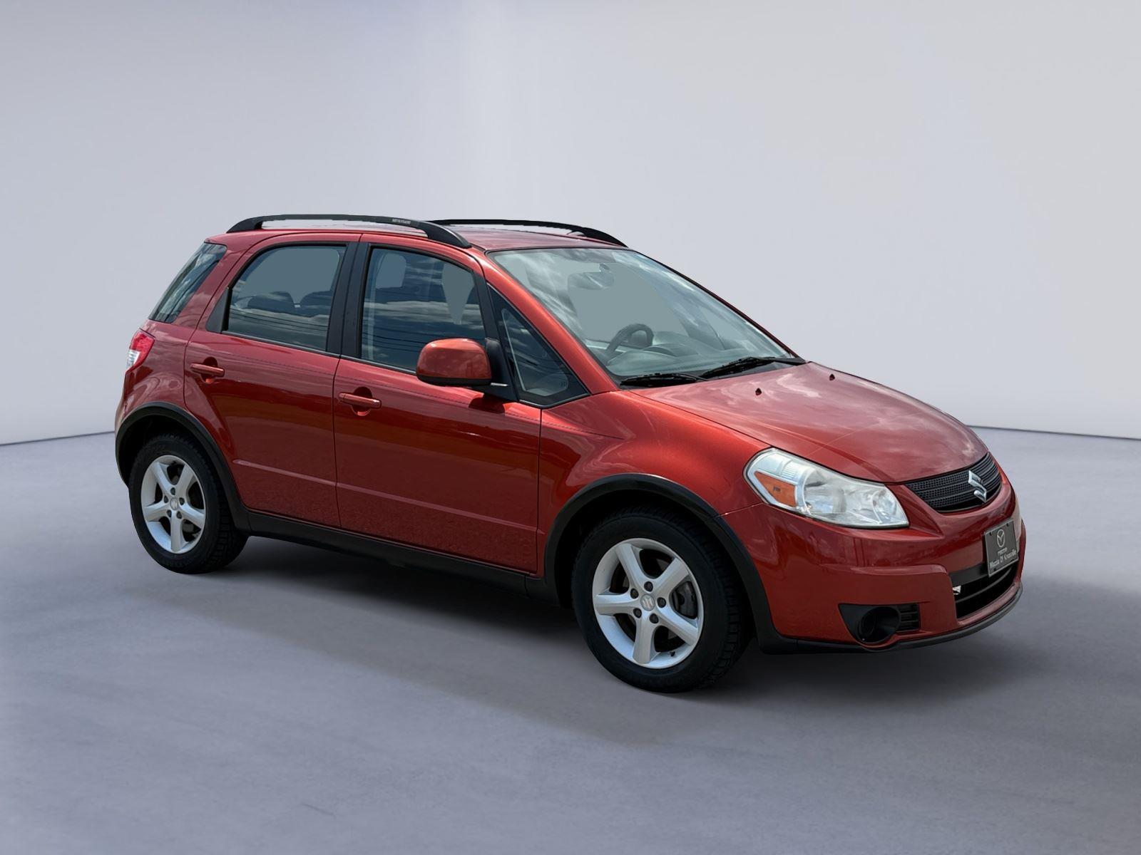 Orange 2009 Suzuki SX4 SUV / Crossover All-Wheel Drive Automatic