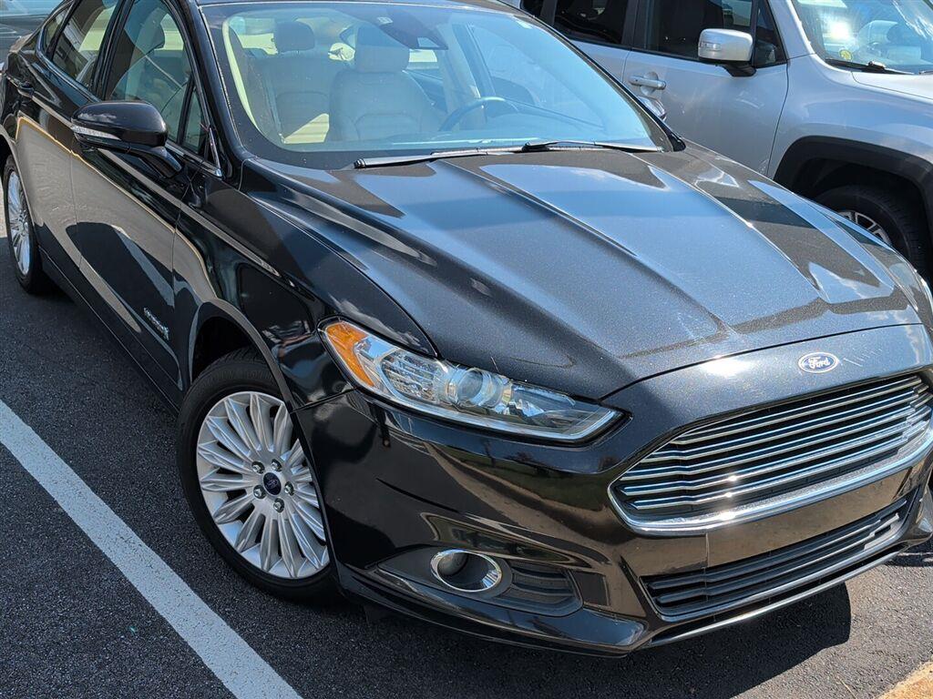 Tuxedo Black Metallic 2014 Ford Fusion Hybrid Sedan Front-Wheel Drive Continuously Variable Transmission