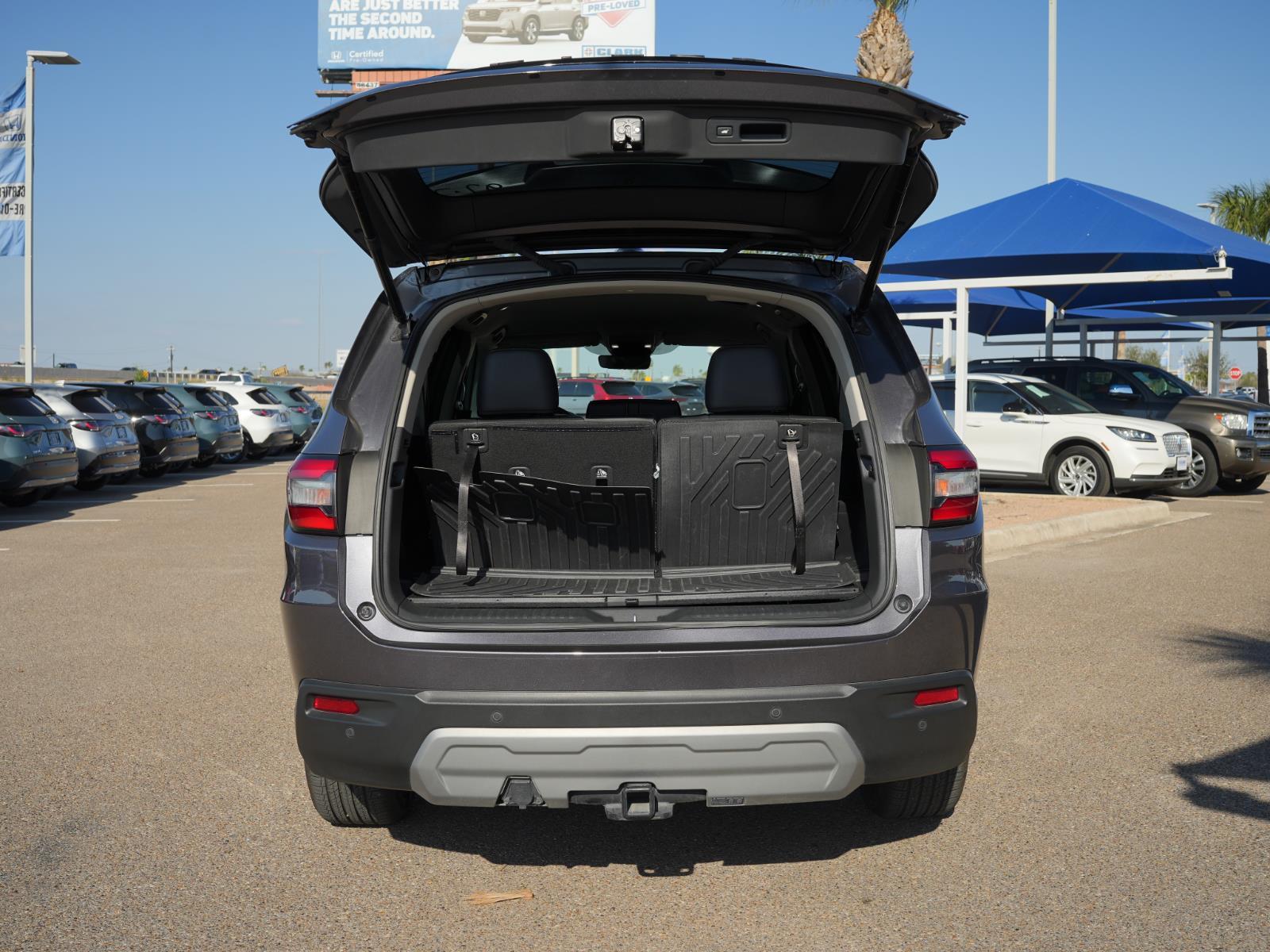 View vehicle photo 4