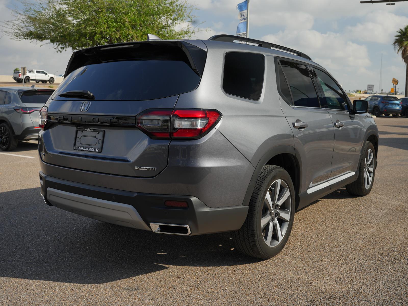 View vehicle photo 5