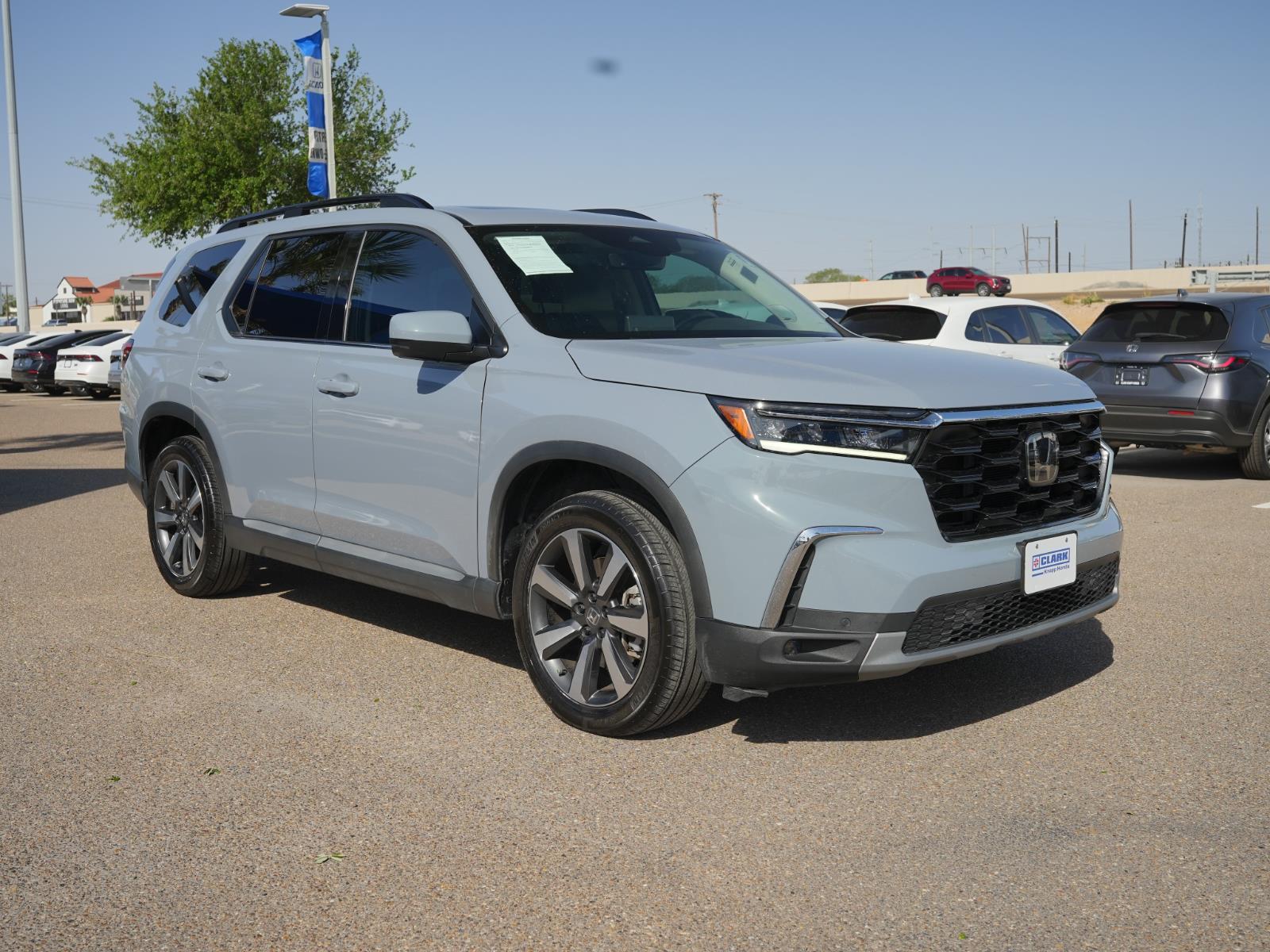 View vehicle photo 3