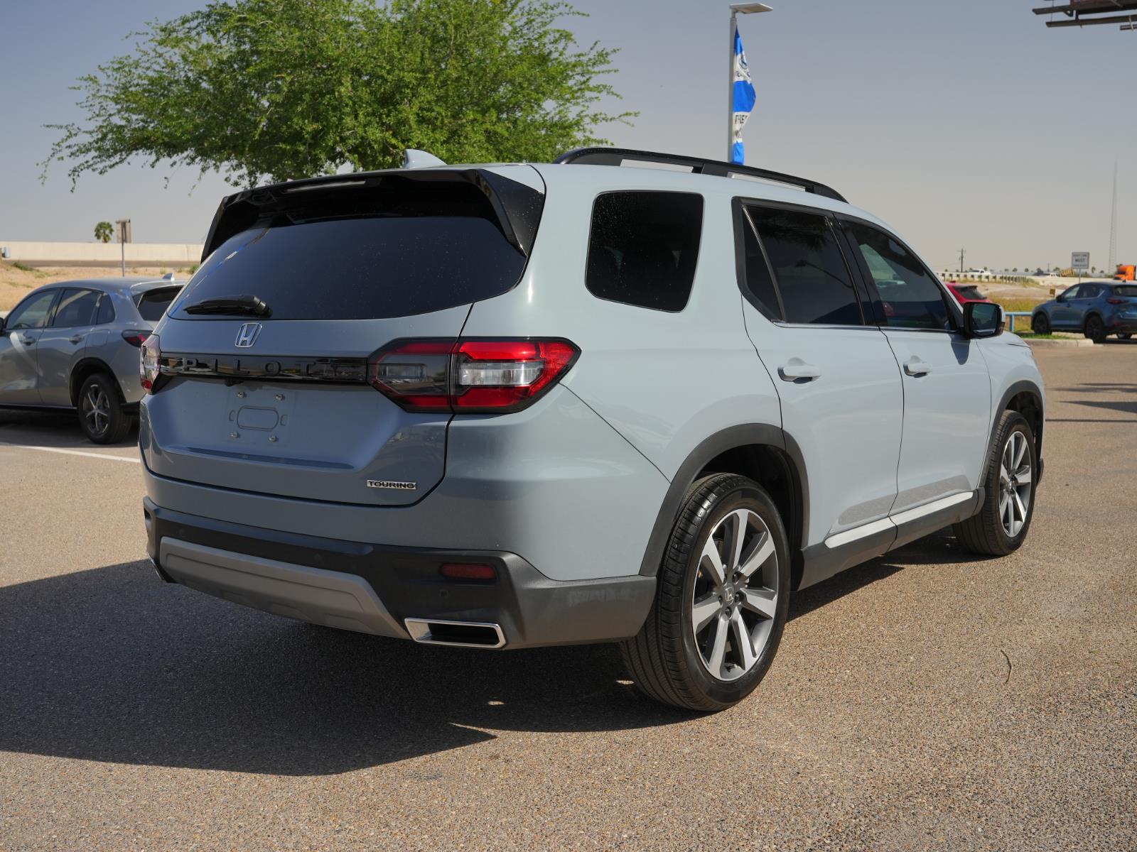 View vehicle photo 5