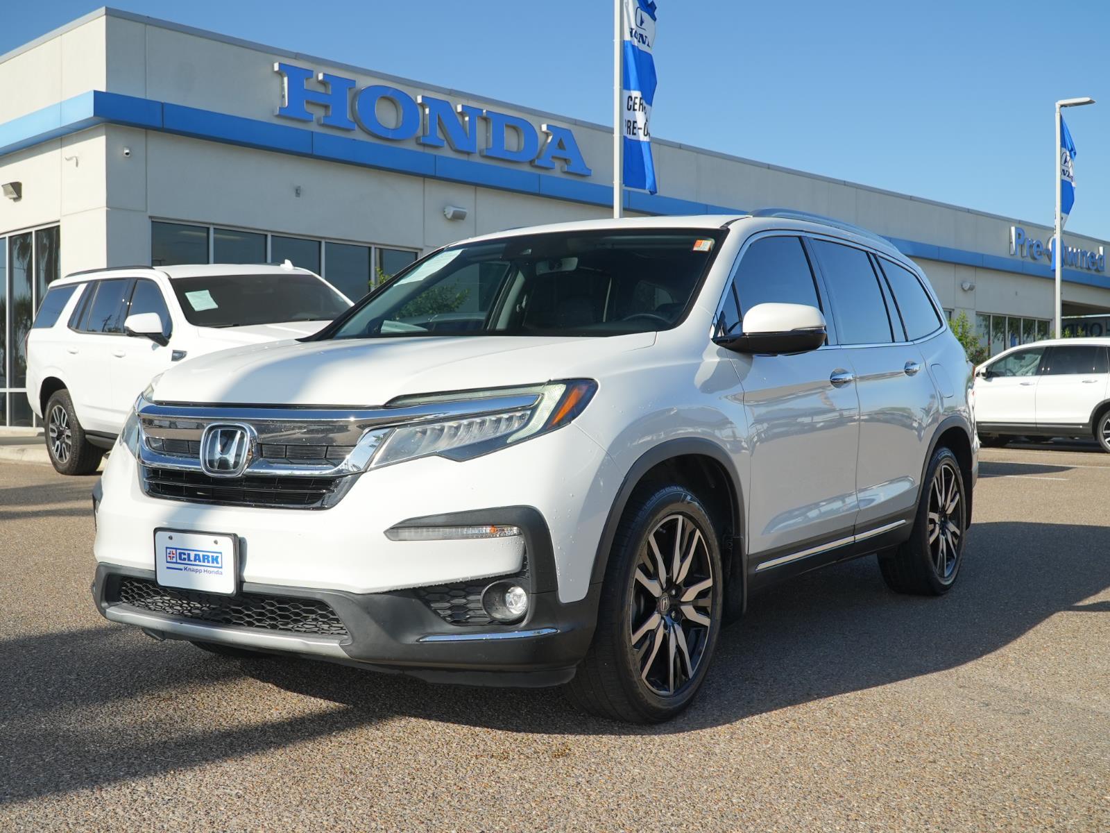 Platinum White Pearl 2020 Honda Pilot Touring FWD with Rear Captain's Chairs SUV / Crossover Front-Wheel Drive 9-Speed Automatic