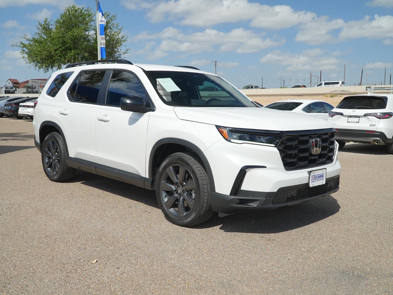 View vehicle photo 3