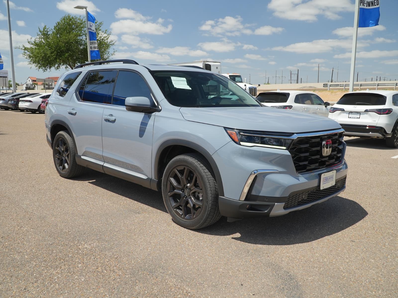 View vehicle photo 3