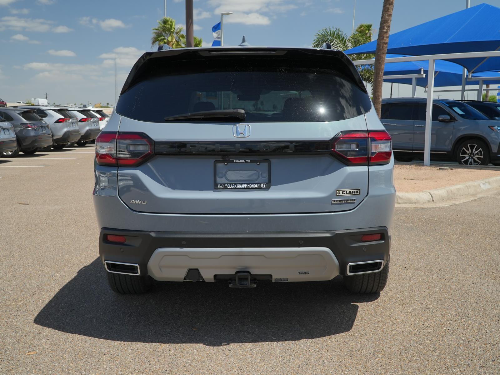 View vehicle photo 6