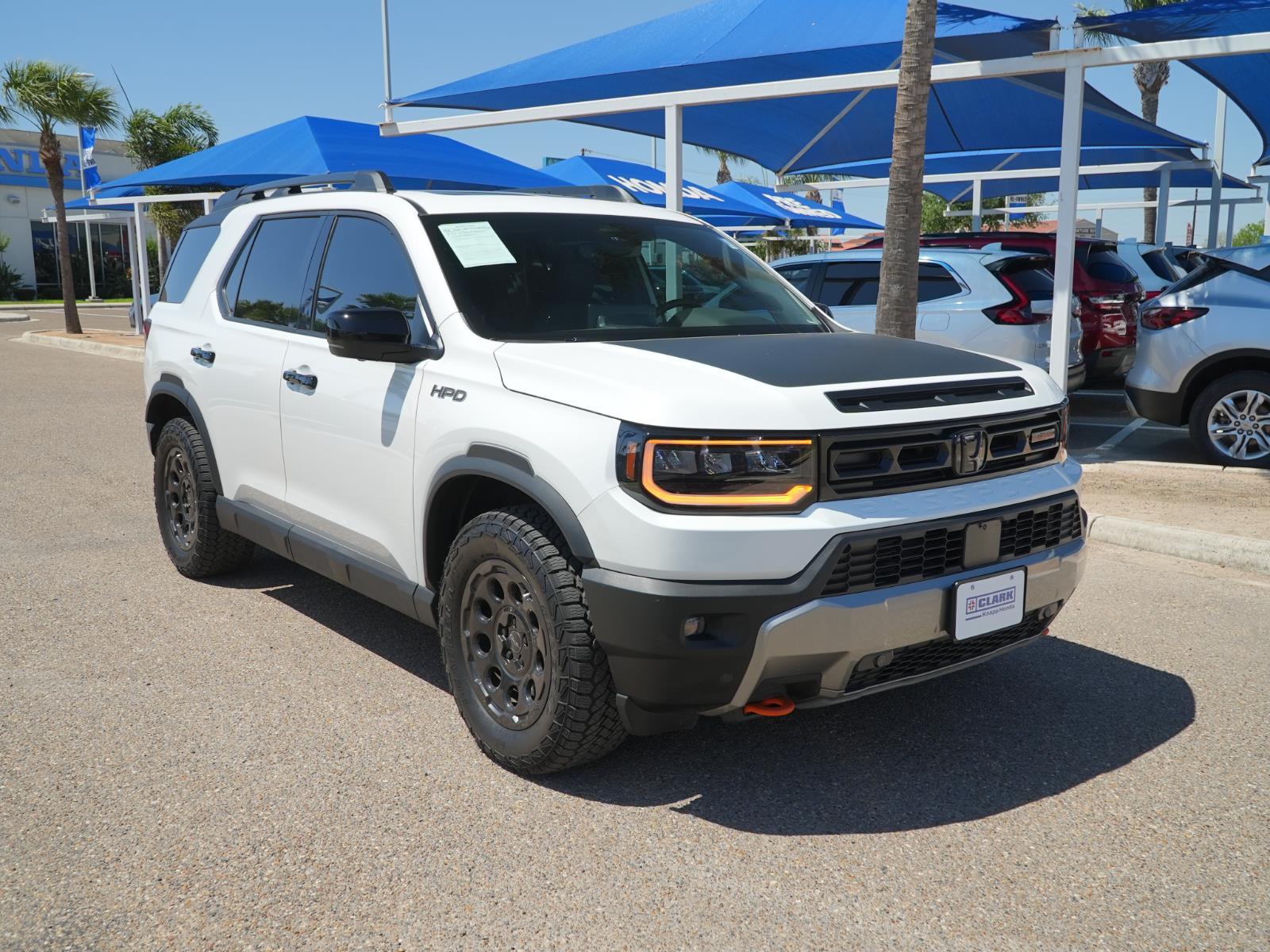 View vehicle photo 3