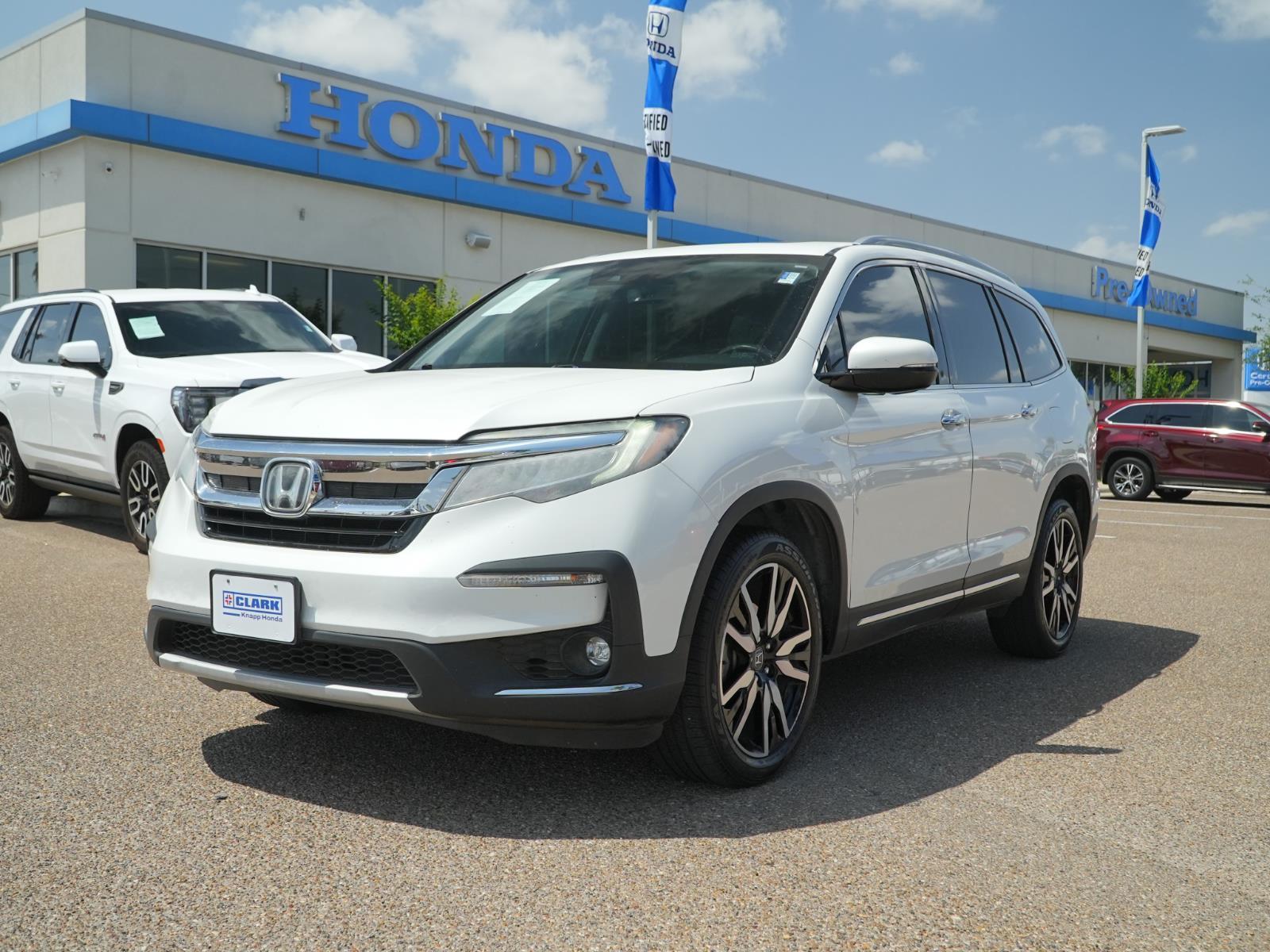 Platinum White Pearl 2022 Honda Pilot Touring FWD with Rear Captain's Chairs SUV / Crossover Front-Wheel Drive 9-Speed Automatic