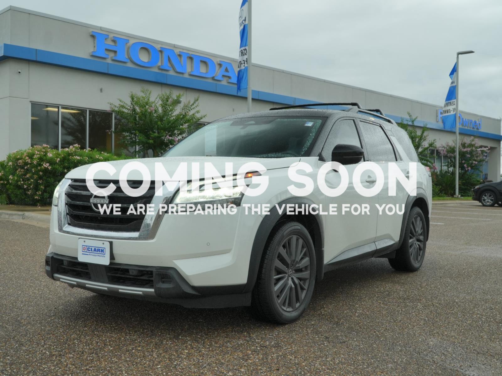 Pearl White Tricoat/Super Black 2023 Nissan Pathfinder SL FWD SUV / Crossover Front-Wheel Drive Automatic