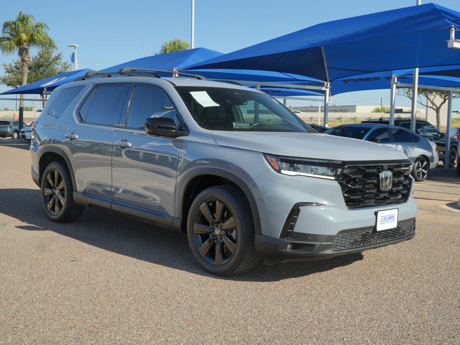 View vehicle photo 3