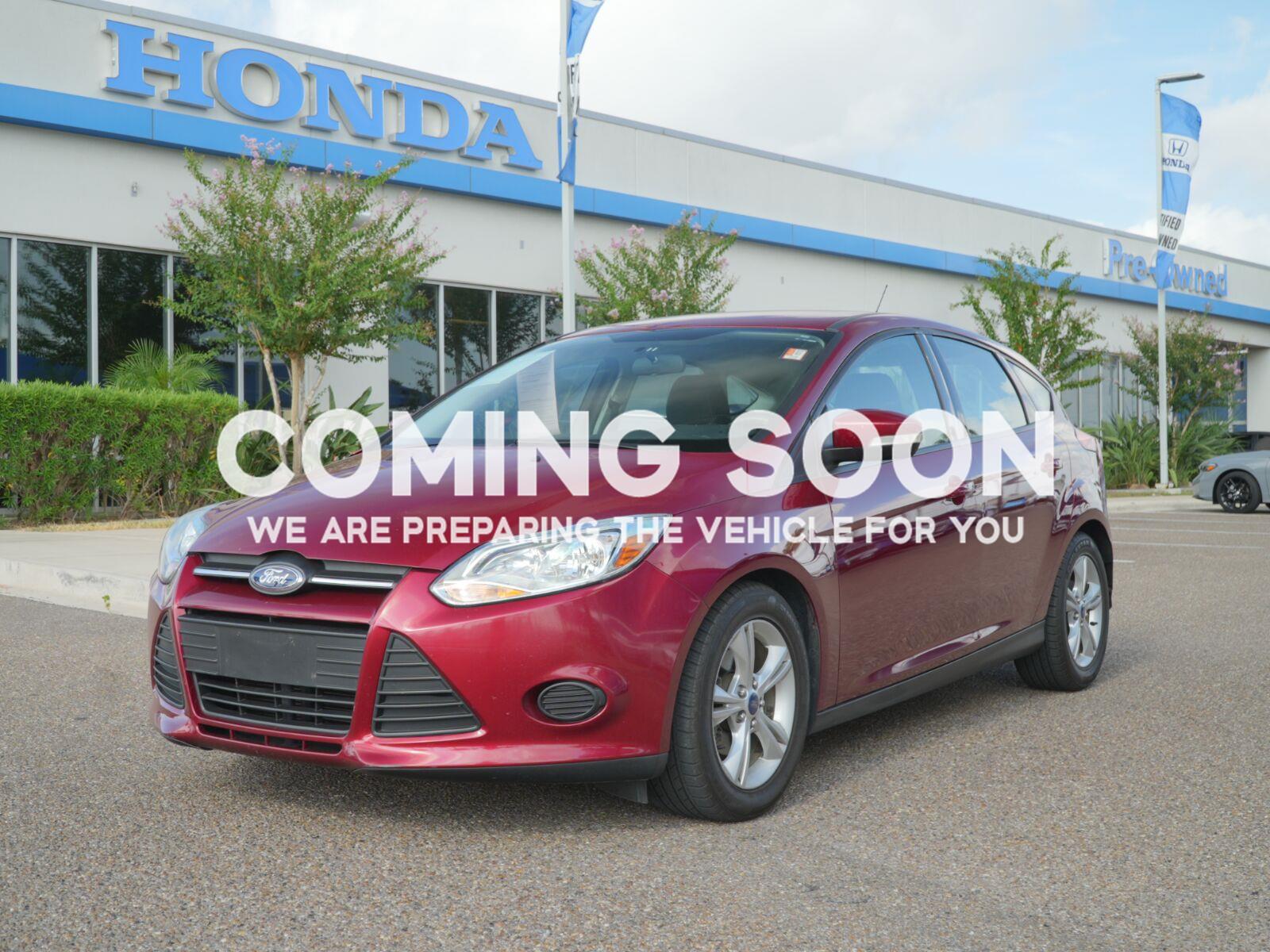 Ruby Red Metallic Tinted Clearcoat 2014 Ford Focus Hatchback Front-Wheel Drive 6-Speed Automatic