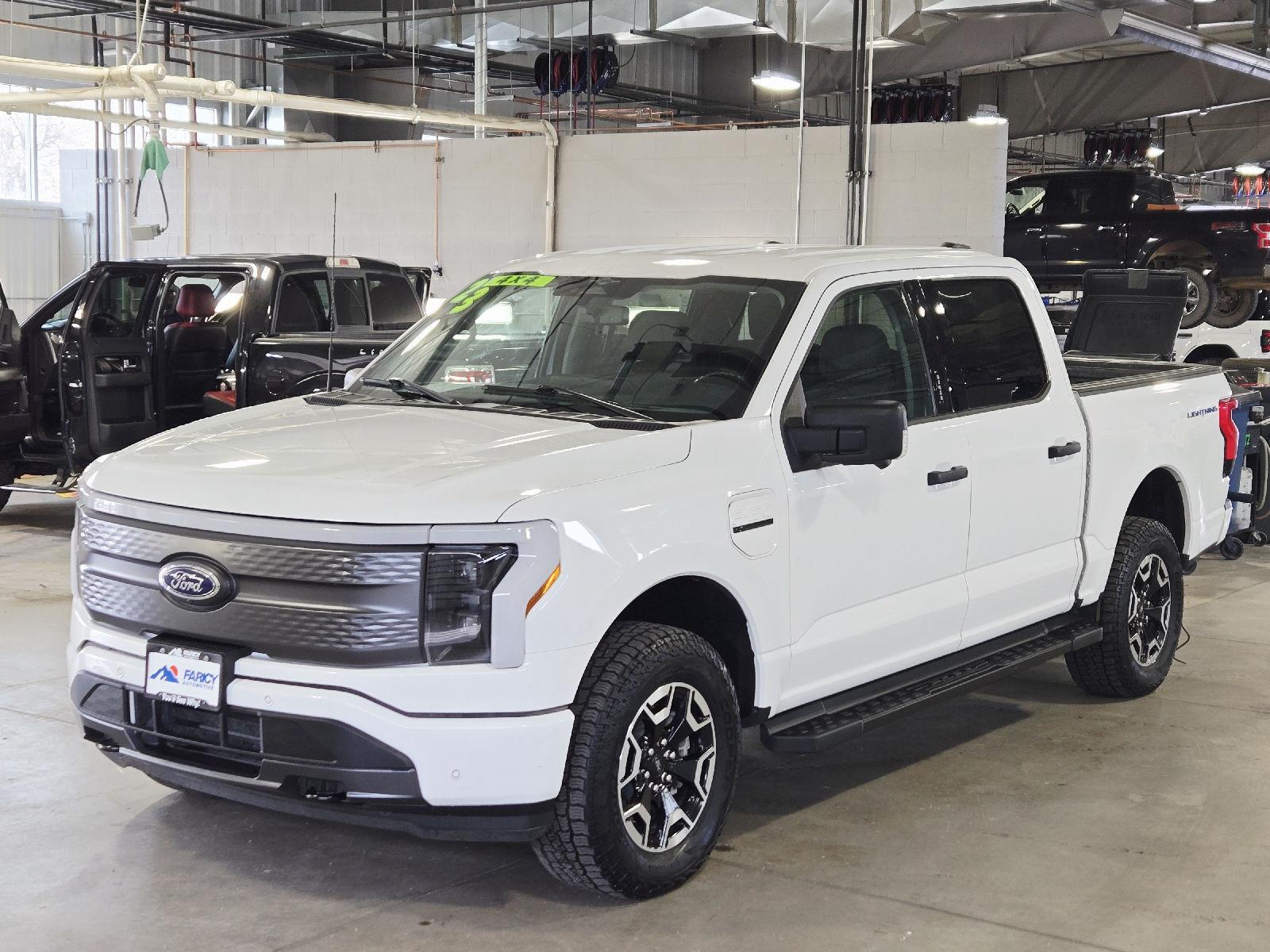 Oxford White 2023 Ford F-150 Lightning XLT SuperCrew AWD Pickup Truck All-Wheel Drive 1-Speed Dual Clutch