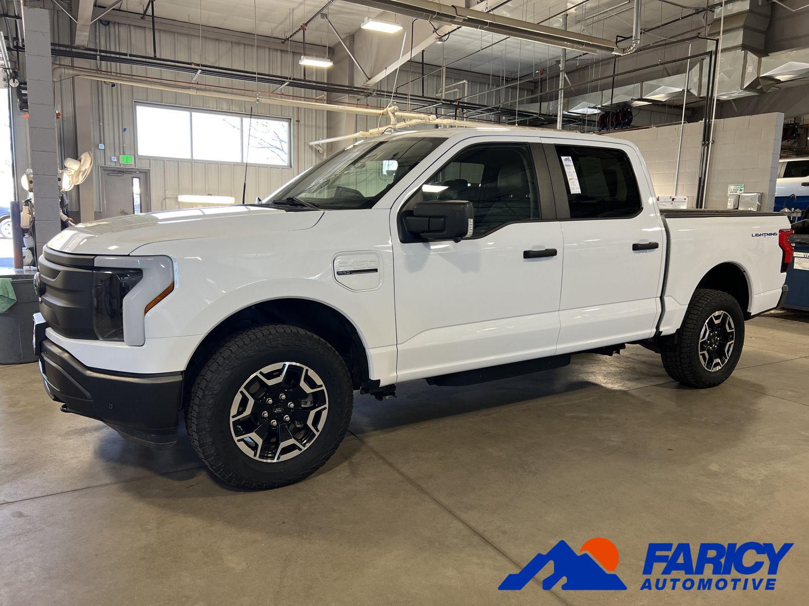 Oxford White 2023 Ford F-150 Lightning Pro SuperCrew AWD Pickup Truck All-Wheel Drive 1-Speed Dual Clutch