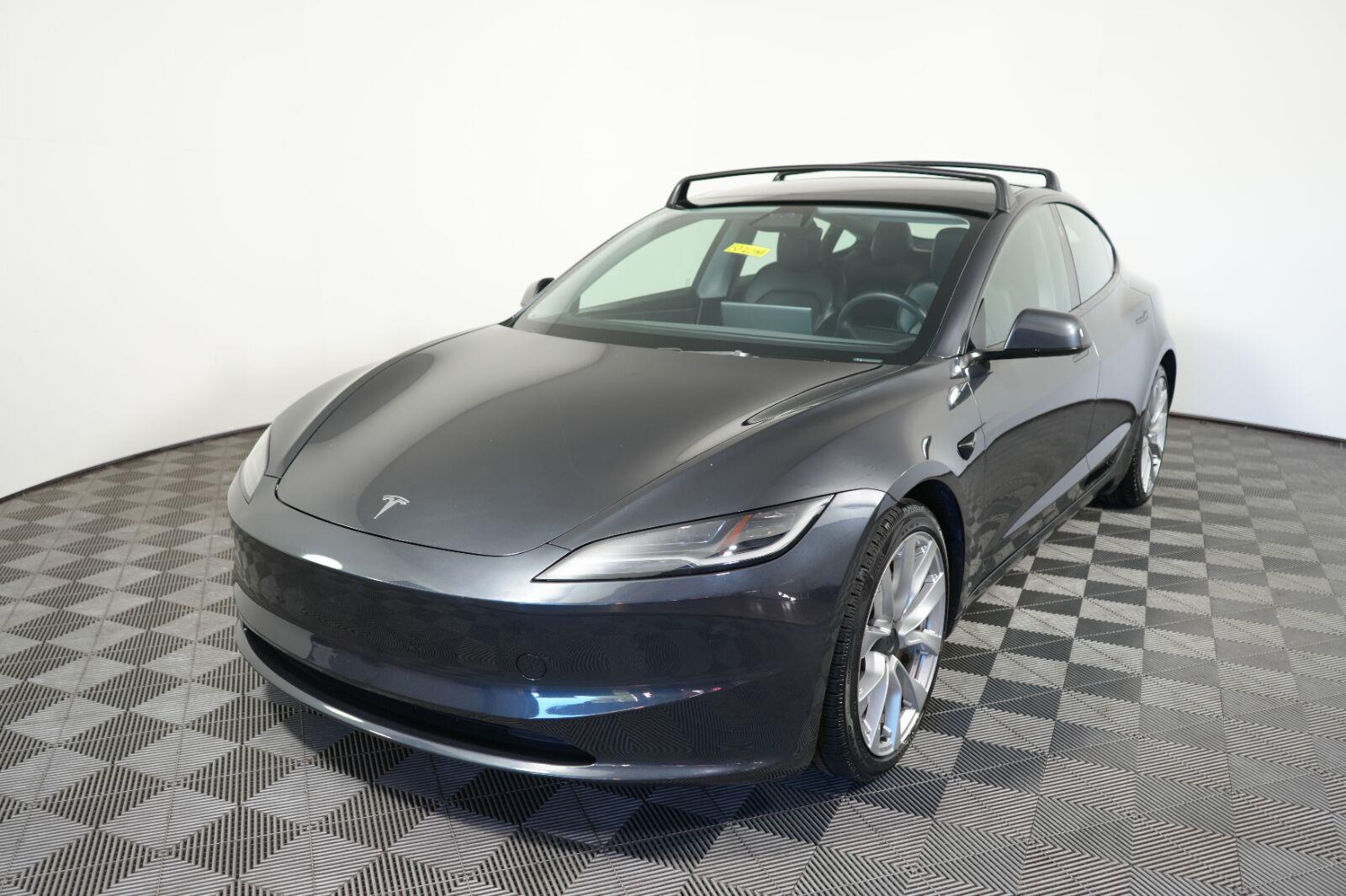 Solid Black 2024 Tesla Model 3 Sedan All-Wheel Drive Automatic