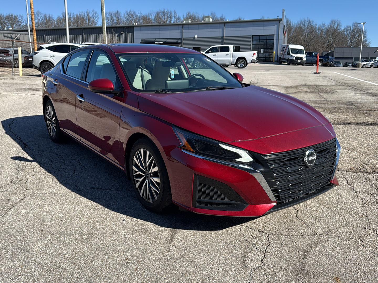 Red (Scarlet Ember Tintcoat) 2023 Nissan Altima 2.5 SV FWD Sedan Front-Wheel Drive Continuously Variable Transmission