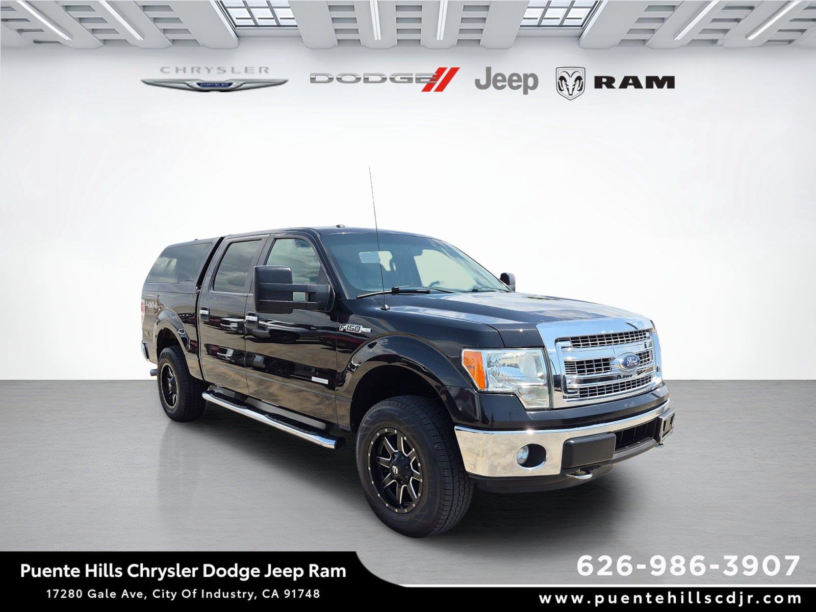 Tuxedo Black Metallic 2014 Ford F-150 Pickup Truck Four-Wheel Drive 6-Speed Automatic