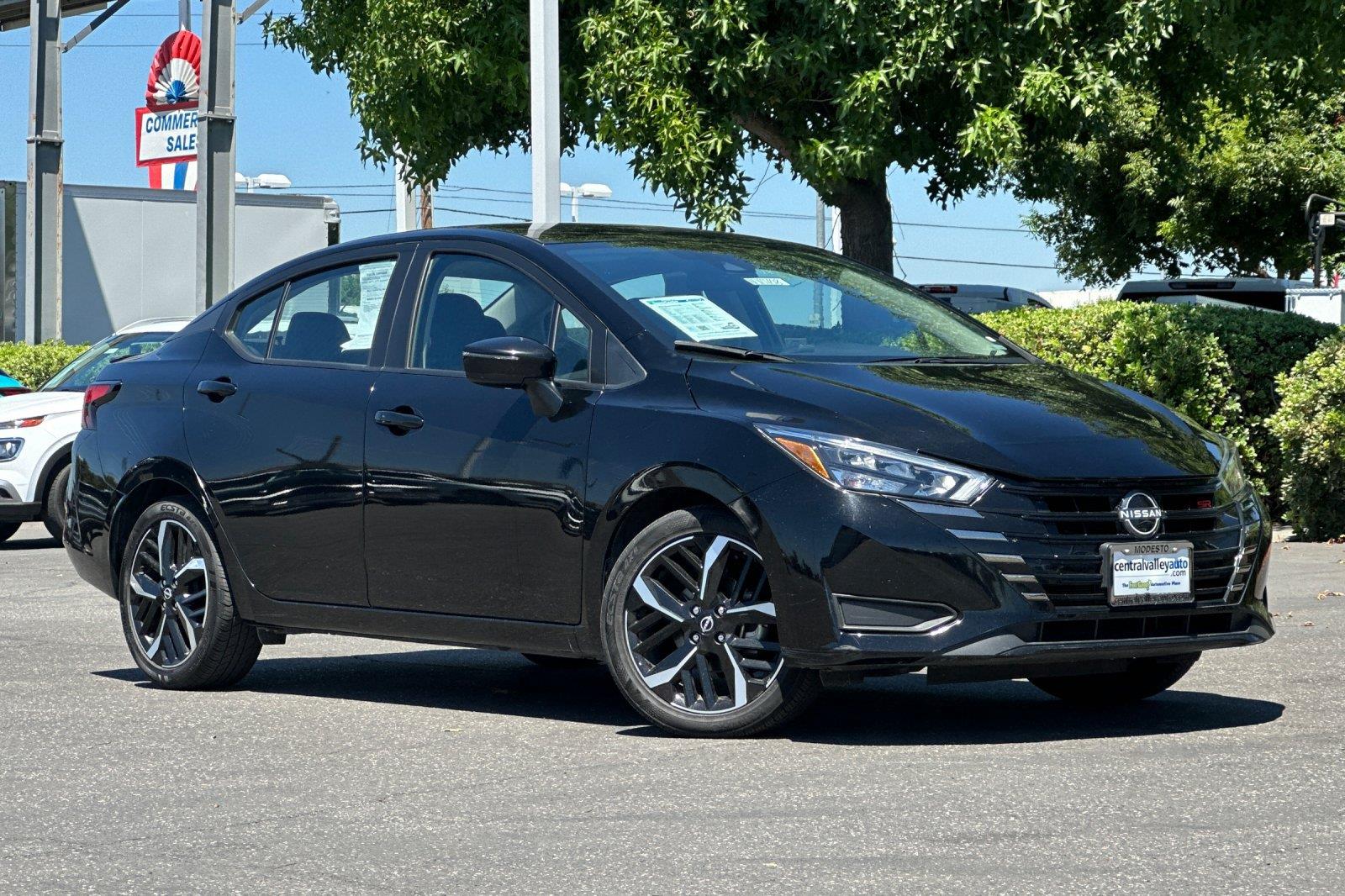 Super Black 2024 Nissan Versa Sedan Front-Wheel Drive Continuously Variable Transmission