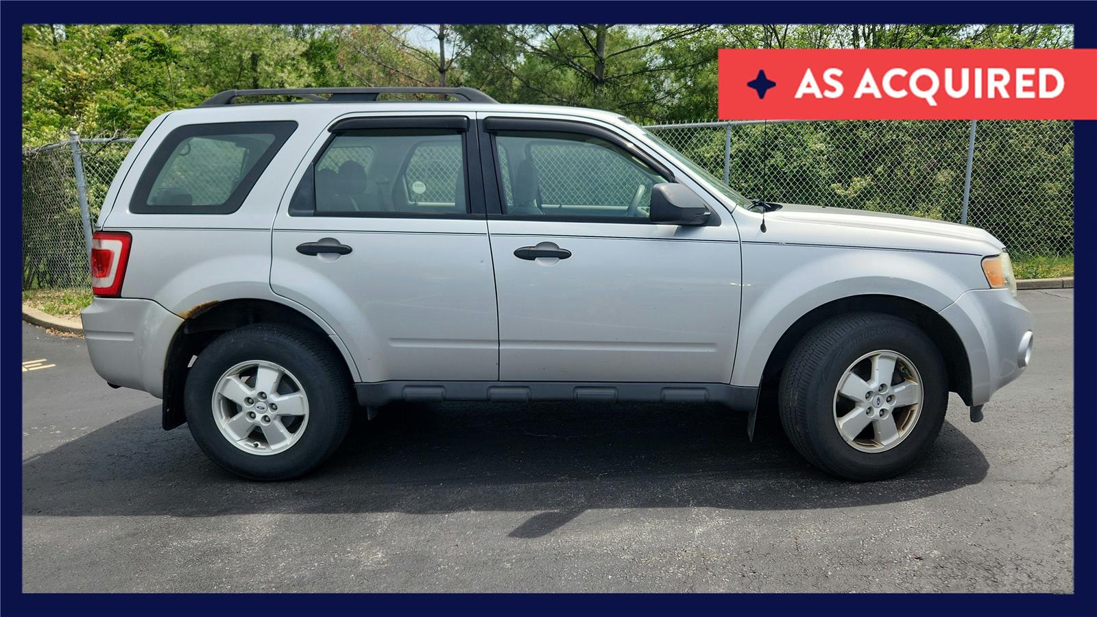 Ingot Silver Metallic 2010 Ford Escape XLS FWD SUV / Crossover Front-Wheel Drive 5-Speed Manual Overdrive