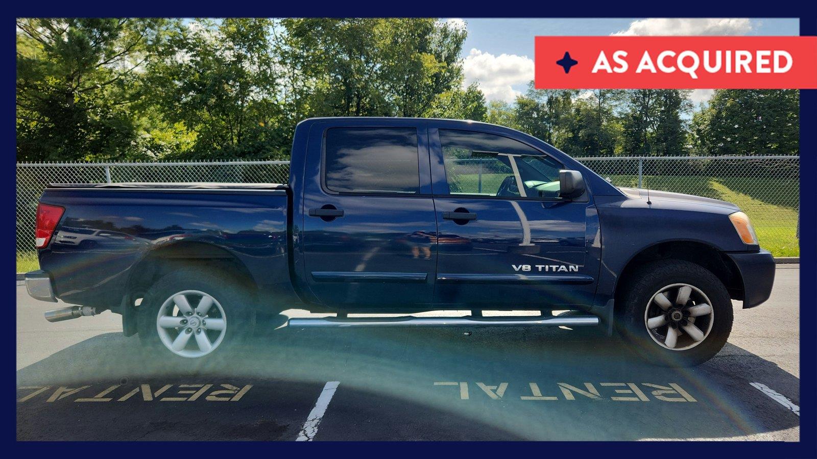 Navy Blue Metallic 2010 Nissan Titan Pickup Truck Four-Wheel Drive Automatic