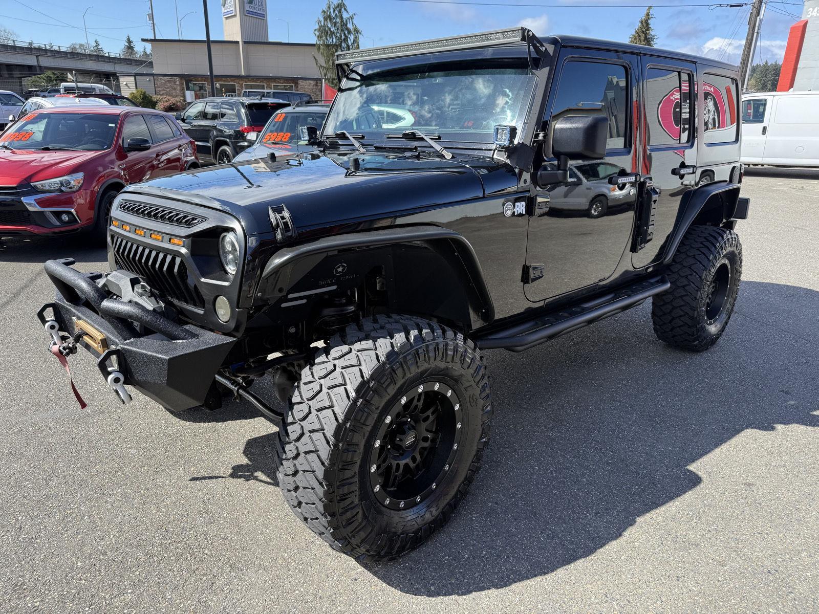 Black Clearcoat 2014 Jeep Wrangler Unlimited Sahara 4WD SUV / Crossover Four-Wheel Drive 5-Speed Automatic