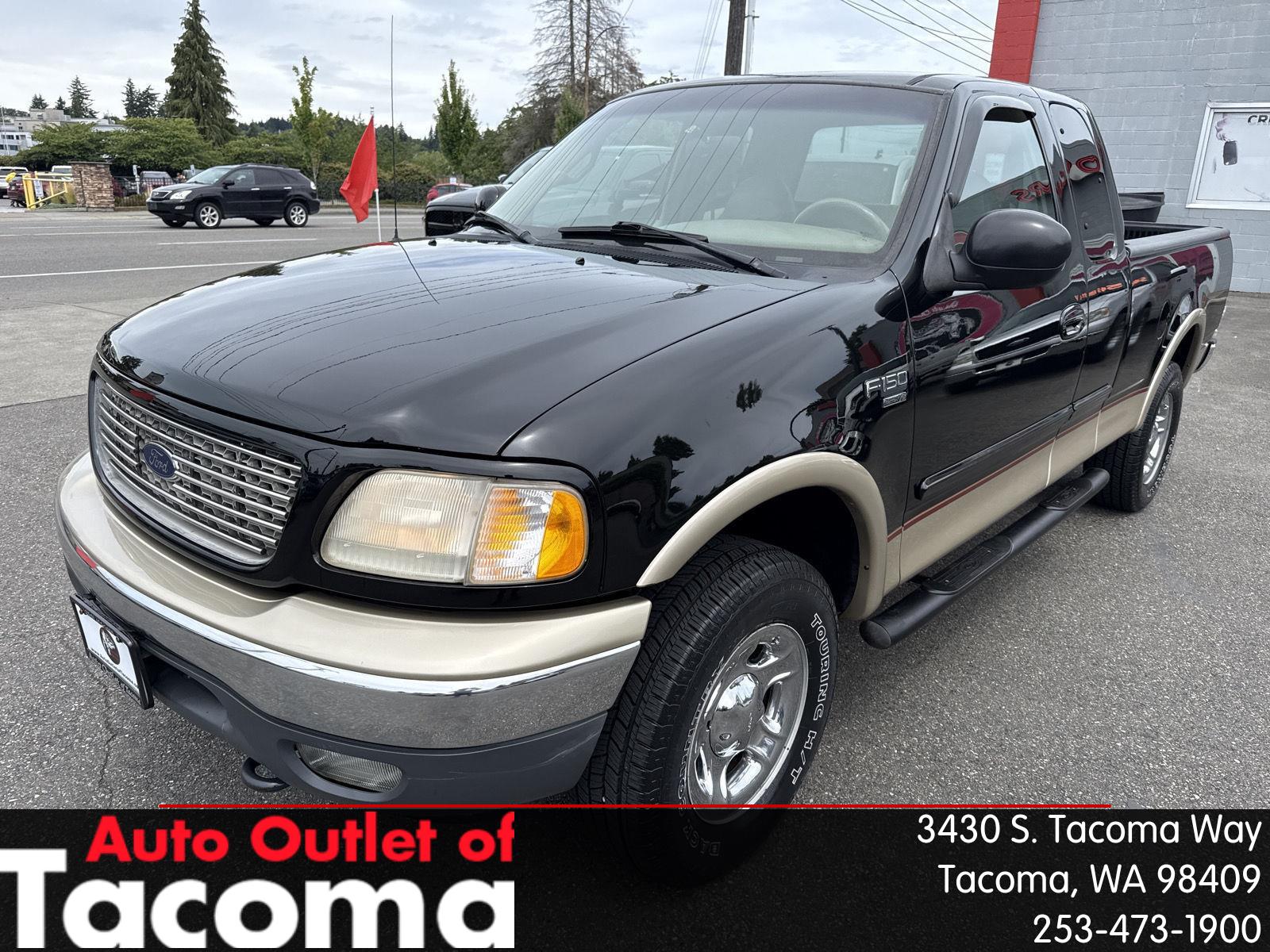 Black 2000 Ford F-150 Pickup Truck Four-Wheel Drive Automatic