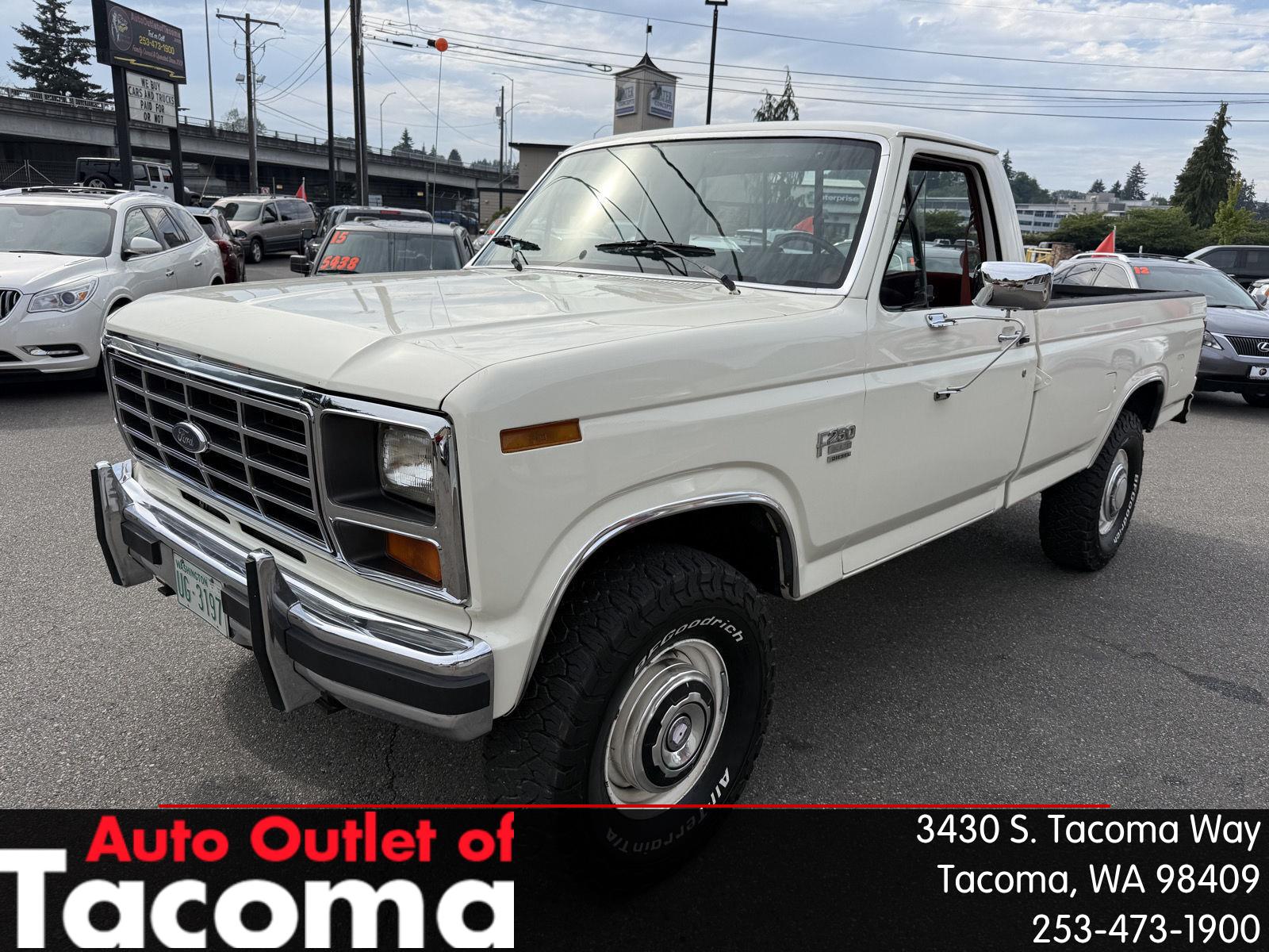 White 1985 Ford F-250 Pickup Truck Four-Wheel Drive Automatic