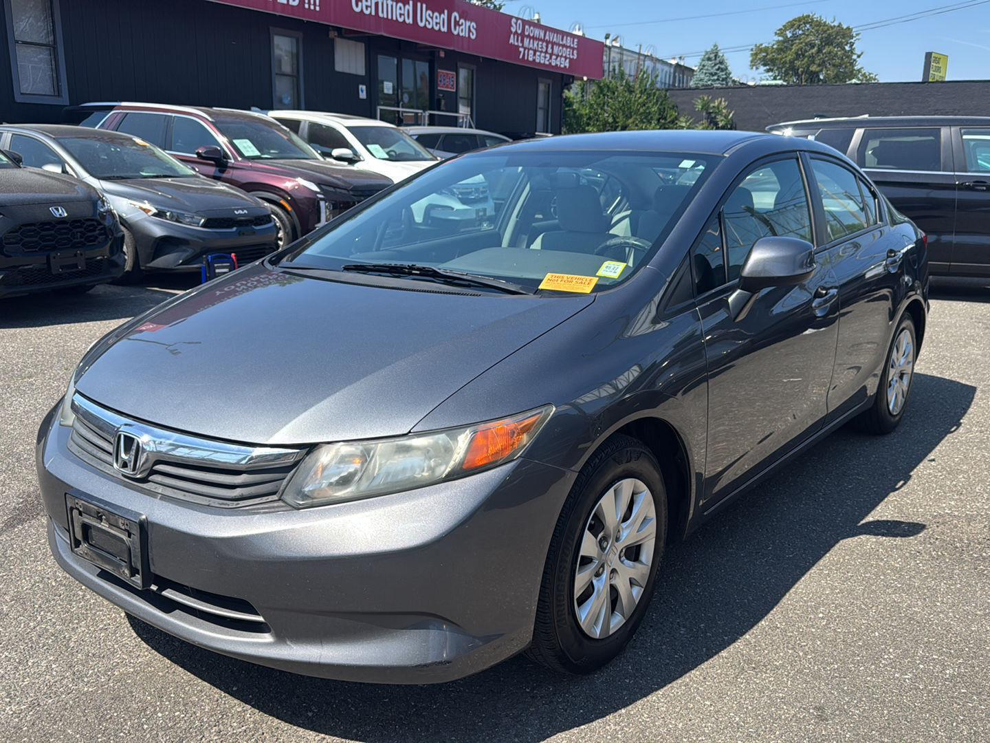 Urban Titanium Metallic 2012 Honda Civic LX Sedan Front-Wheel Drive Automatic
