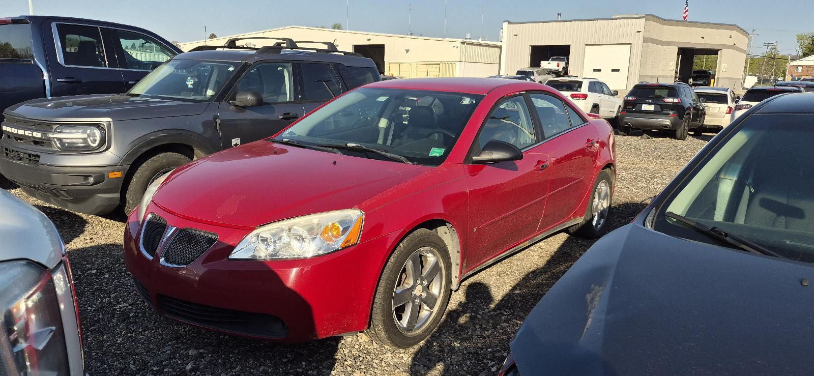 Crimson Red 2007 Pontiac G6 GT Sedan Front-Wheel Drive 4-Speed Automatic Overdrive