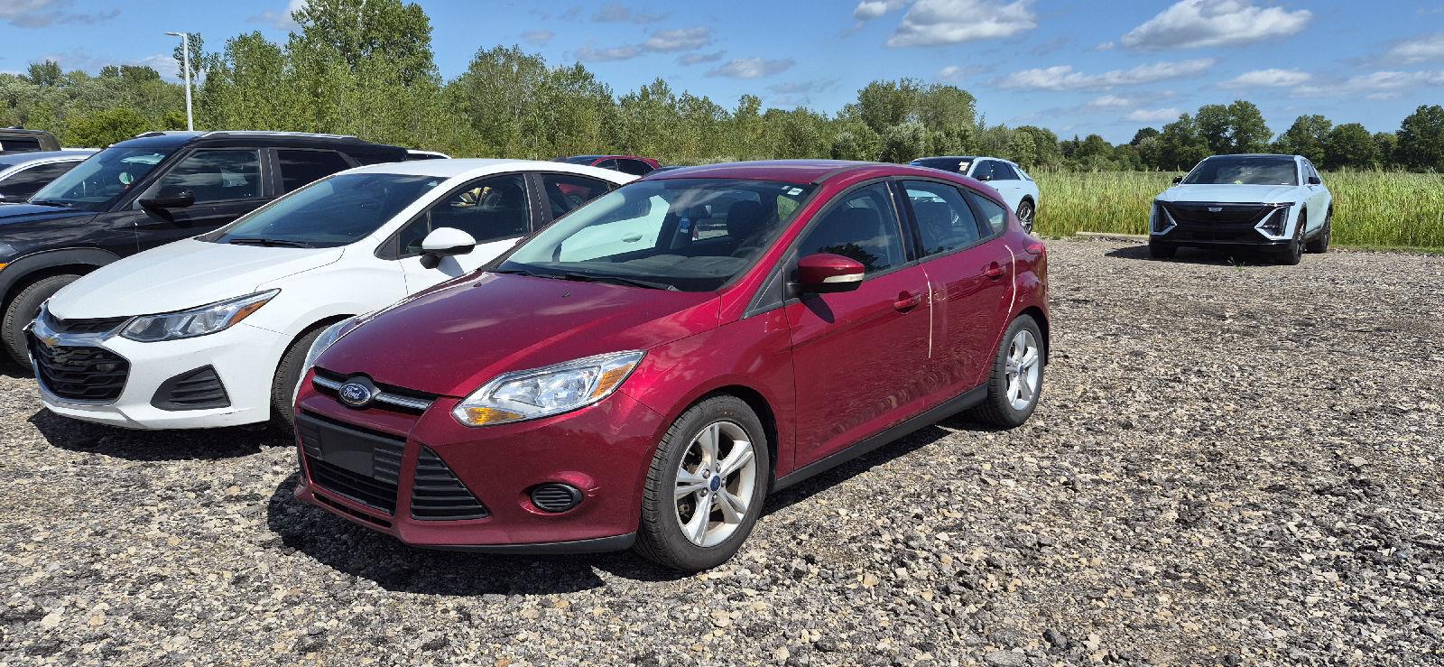 Ruby Red Tinted Clearcoat 2014 Ford Focus Hatchback Front-Wheel Drive 5-Speed Manual
