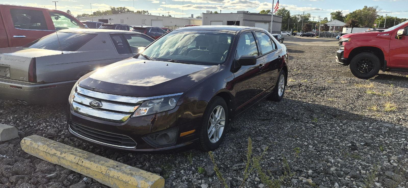 Red Candy Metallic Tinted Clearcoat 2012 Ford Fusion Sedan Front-Wheel Drive 6-Speed Manual