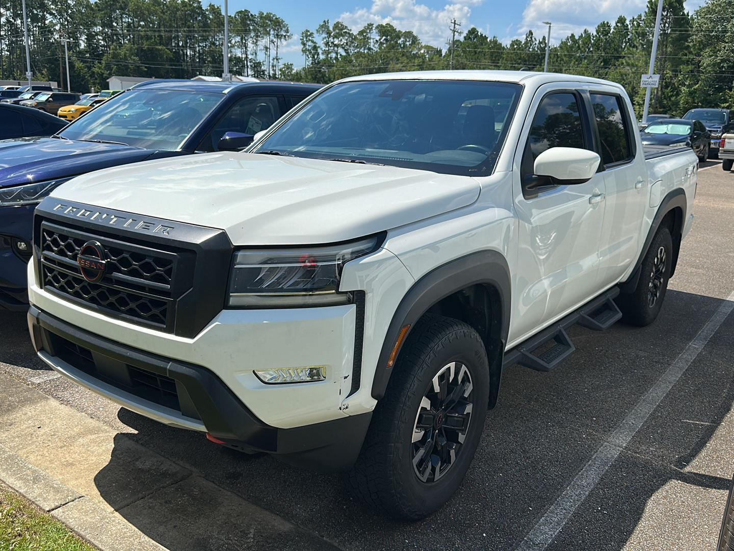 Glacier White 2023 Nissan Frontier Pickup Truck 4X2 Automatic