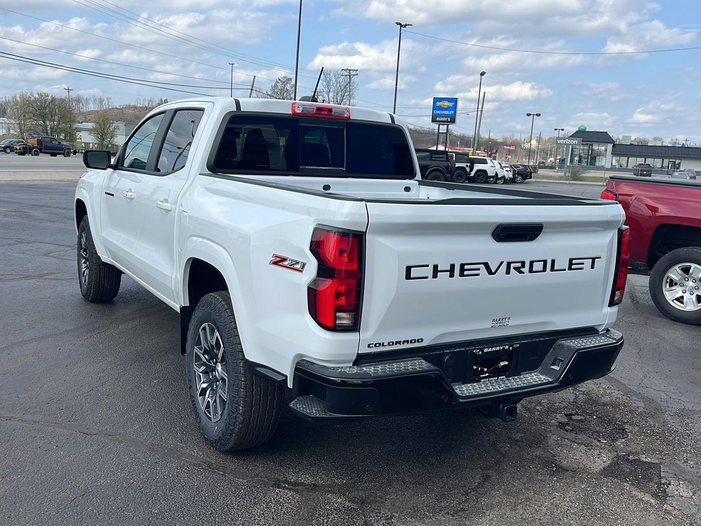 View vehicle photo 3