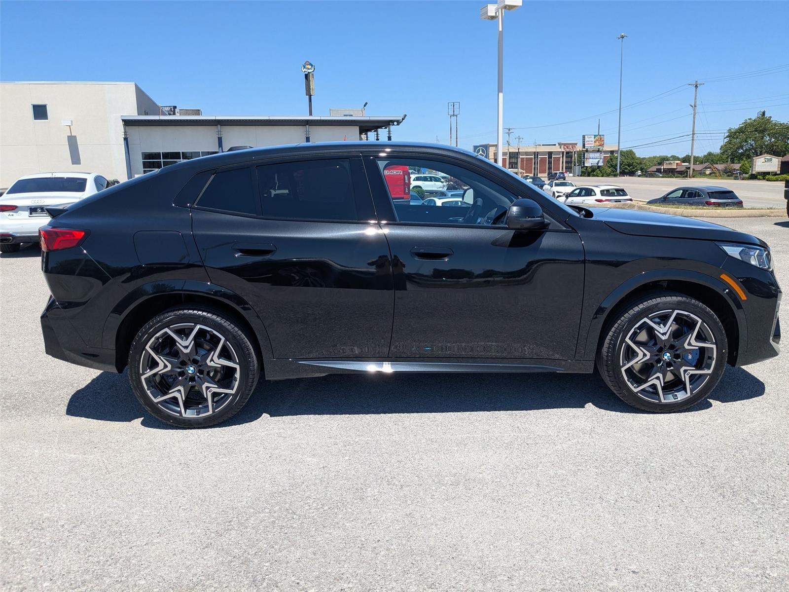 New 2026 Black Sapphire Metallic BMW xDrive28i image 4